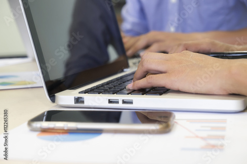 Young man and woman startups business meeting to discuss the situation on the marketing.   