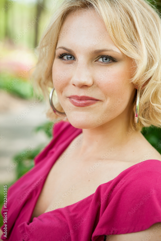 Happy woman in garden portrait