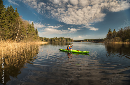 kayaker in the lake photo
