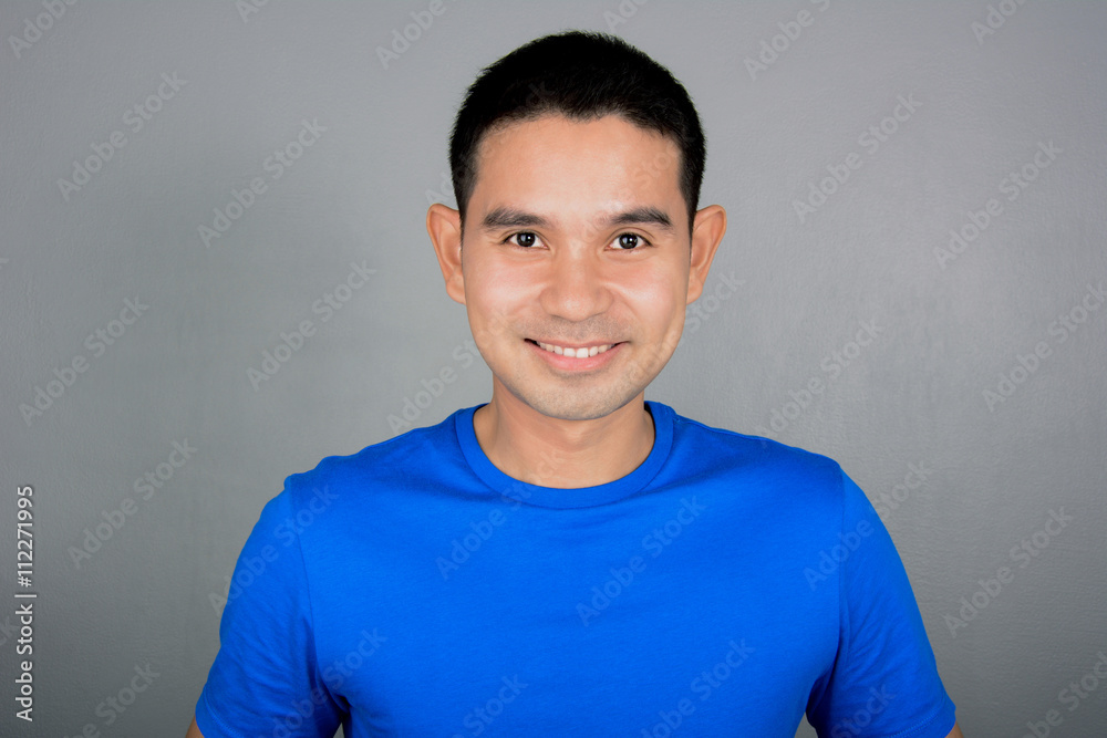 Obraz premium Friendly Asian man with smiling face