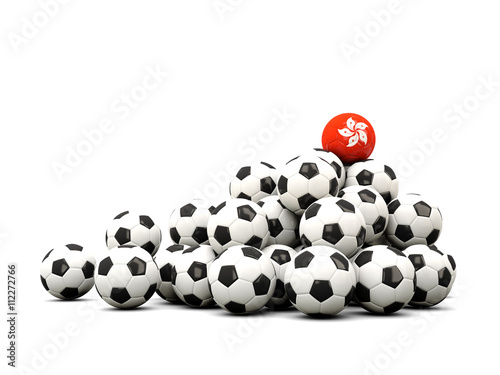 Pile of soccer balls with flag of hong kong