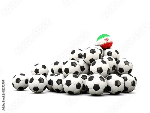 Pile of soccer balls with flag of iran