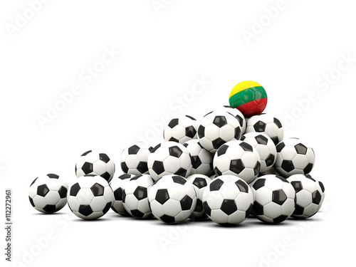 Pile of soccer balls with flag of lithuania