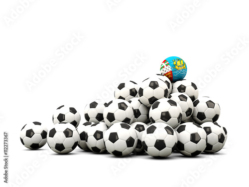 Pile of soccer balls with flag of saint pierre and miquelon