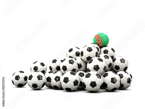 Pile of soccer balls with flag of turkmenistan