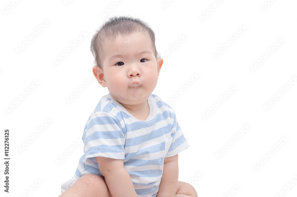 Little asian child sitting and looking at camera Little asian child sitting and looking at camera