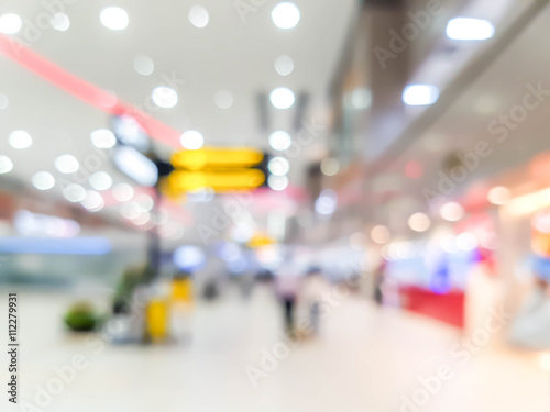 blurred photo of people at the airport © naiyanab