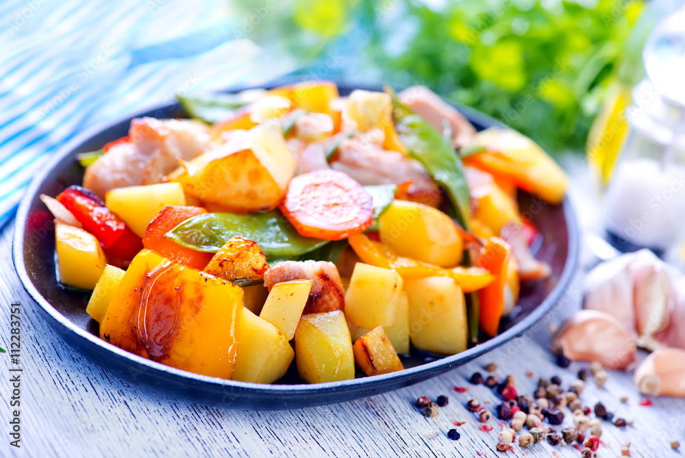 fried meat with vegetables fried meat with vegetables