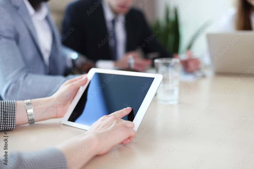 Business adviser analyzing financial figures denoting the progress in the work of the company Business adviser analyzing financial figures denoting the progress in the work of the company
