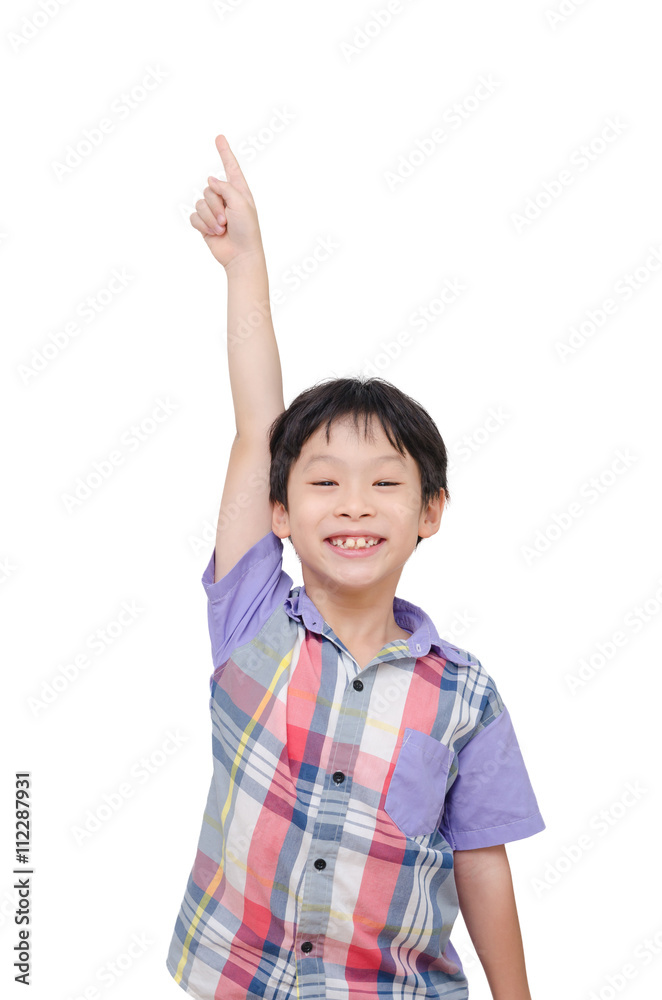 Young asian boy pointing up over white background Young asian boy pointing up over white background