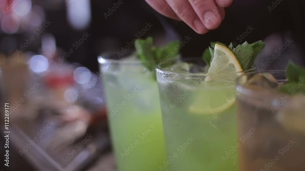 Bartender make cocktail in a bar Bartender make cocktail in a bar