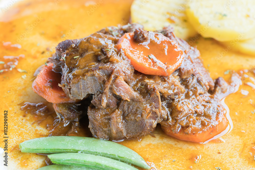 Beef stew with carrot. Top view.
Beef stew with carrot. Top view.