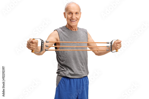 Elderly man exercising with a resistance band