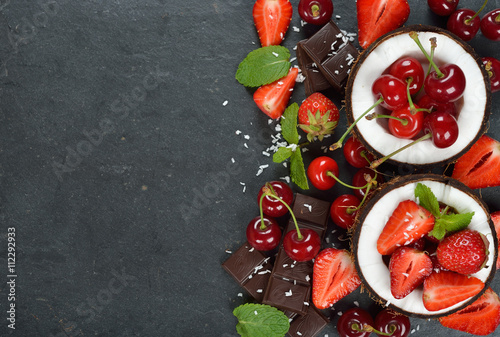 Fototapeta Naklejka Na Ścianę i Meble -  Coconut, strawberry, cherry and chocolate