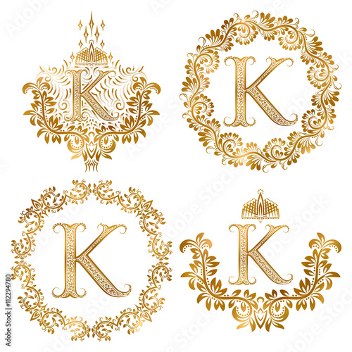 Golden letter K vintage monograms set. Heraldic monogram in coats of arms form  letter K in floral round frame  letter K in wreath  heraldic monogram in floral decoration with crown.