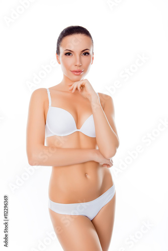 Sensitive young woman in lingerie showing her healthy body