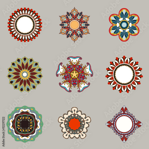 Set of decorative design elements isolated on grey background. Flowers, snowflakes, abstract floral pattern, decorative sun. Vector logo, emblem, sign, stick figures. Floral ornament. Design template