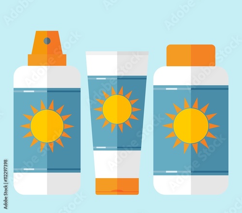 Flat bottles of sunscreen with sun motif