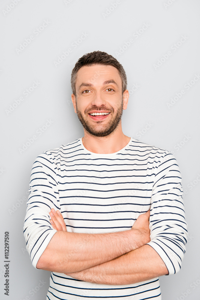 Portrait of sexy handsome bearded man with crossed hands Portrait of sexy handsome bearded man with crossed hands