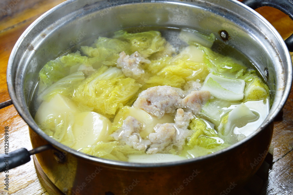 boiled Chinese cabbage with egg tofu and chop pork soup in hot pot boiled Chinese cabbage with egg tofu and chop pork soup in hot pot