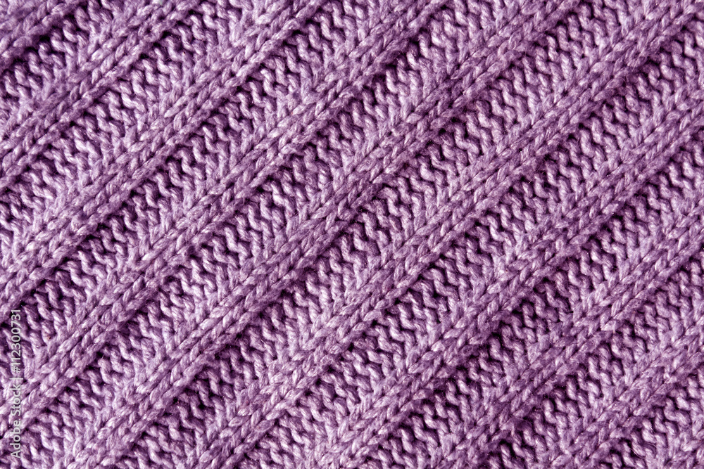 Abstract violet knitted cloth texture. Abstract violet knitted cloth texture.