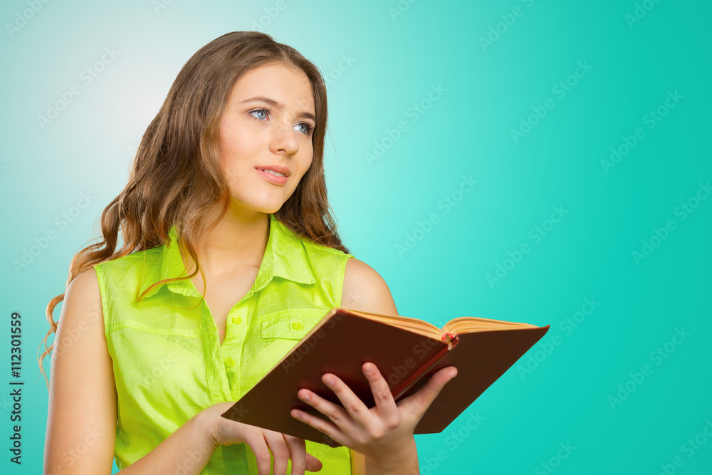 Woman with a book on her hands Woman with a book on her hands