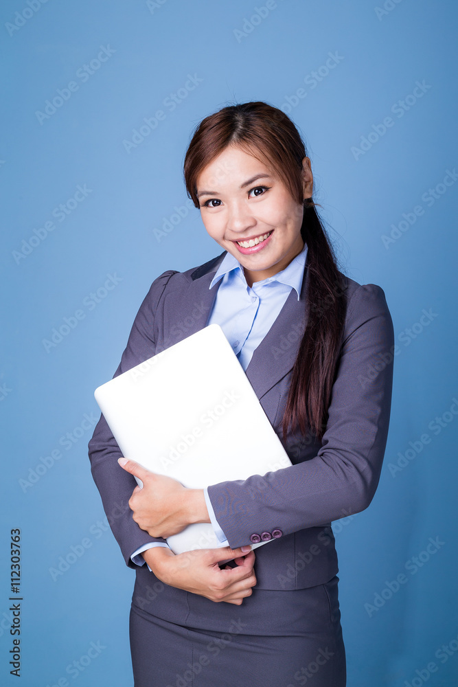 Asian businesswoman hold with laptop computer Asian businesswoman hold with laptop computer