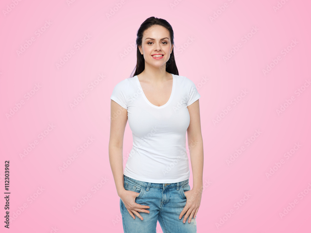 happy young woman or teenage girl in white t-shirt happy young woman or teenage girl in white t-shirt