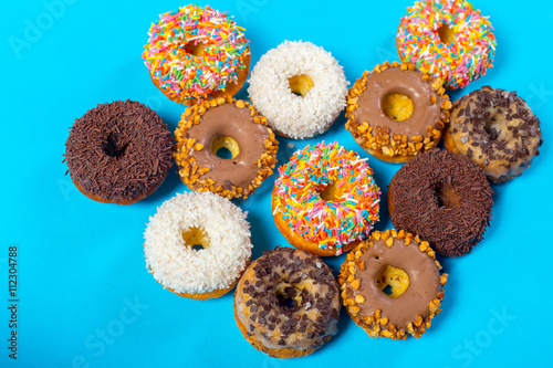 Assorted donuts on a blue background