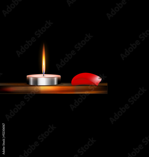 burning candle and red petal