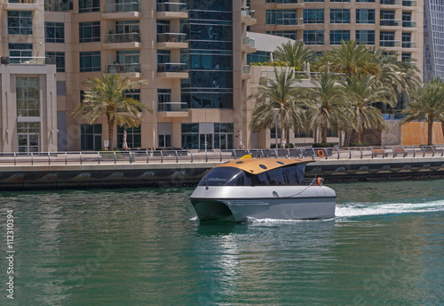 Photography water taxi in gulf of district Marina in Dubai