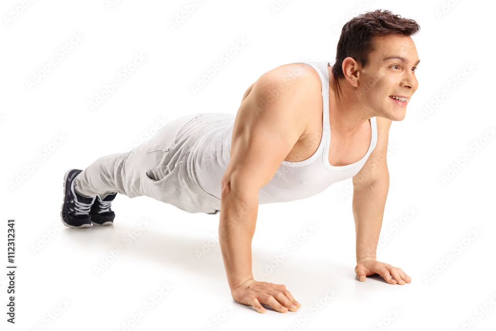 Muscular guy doing push-ups Muscular guy doing push-ups
