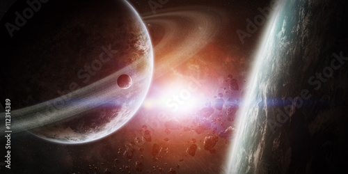 Fototapeta Naklejka Na Ścianę i Meble -  Sunrise over group of planets in space