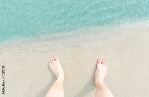 Close up blue sea water waves on white sand beach,Beautiful blue sea beach with white sand, Beautiful blue ocean beach close up shot, Clean beach with blue sea in Thailand