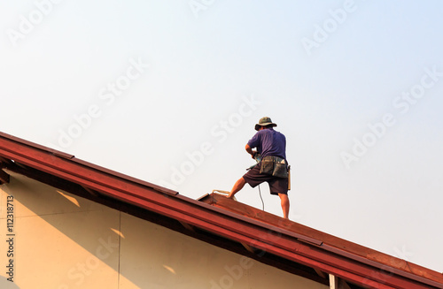Technician is on the roof, the roof was repaired.