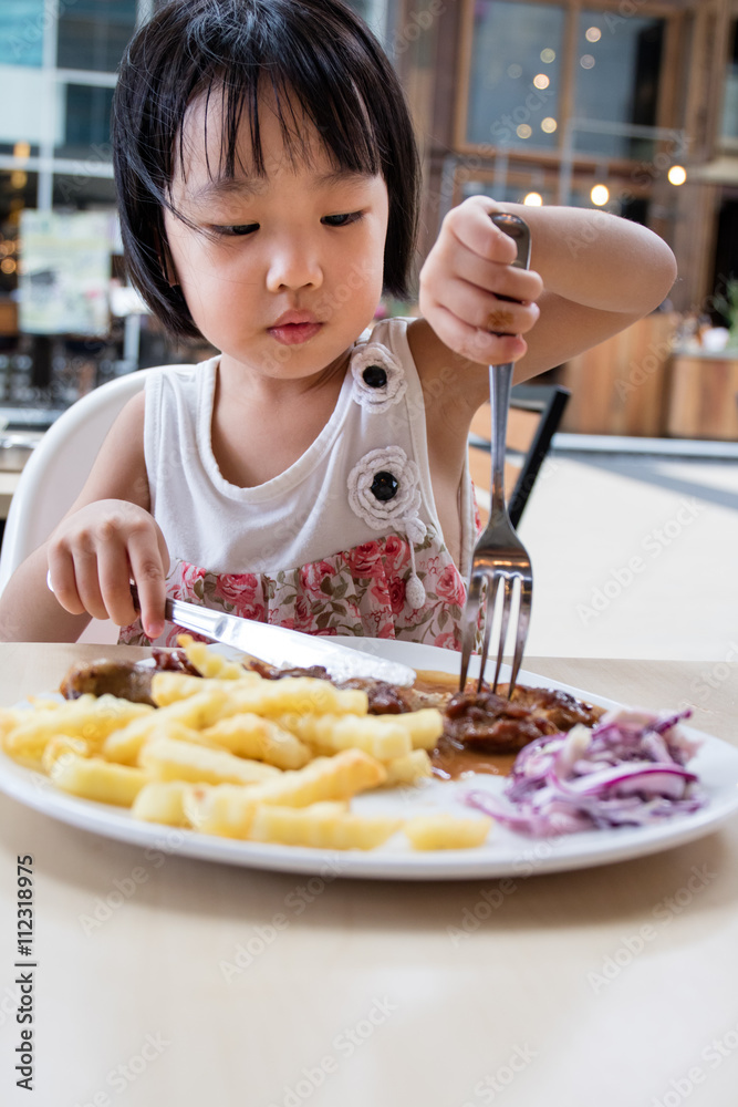 Asian Little Chinese Girl Eating Western Food Asian Little Chinese Girl Eating Western Food
