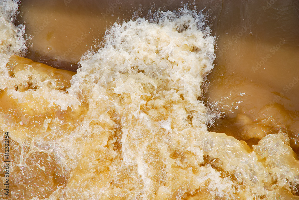 Polluted water stream waterfall fall detail foam Polluted water stream waterfall fall detail foam