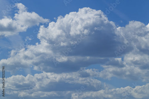 Fototapeta Naklejka Na Ścianę i Meble -  White clouds in the blue sky, sunshine