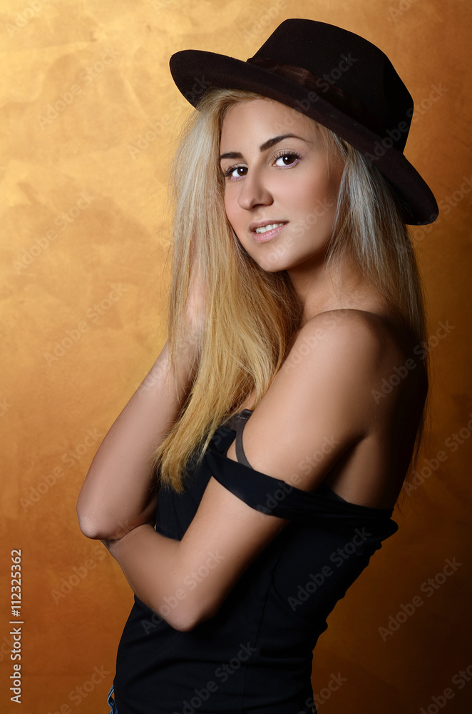 Portrait of beautiful blonde girl in hat Portrait of beautiful blonde girl in hat