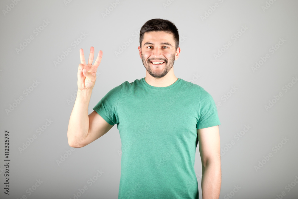 Man showing number by fingers Man showing number by fingers