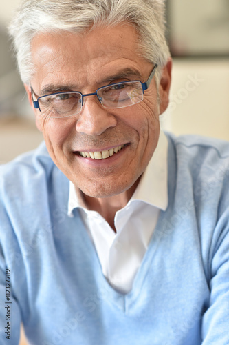 Portrait of senior man with eyeglasses