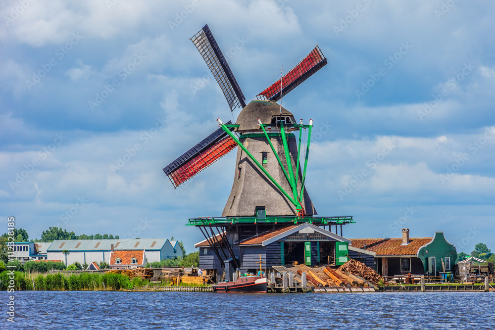 Traditional Dutch old wooden windmill. Zaanse Schans, Zaandam. 