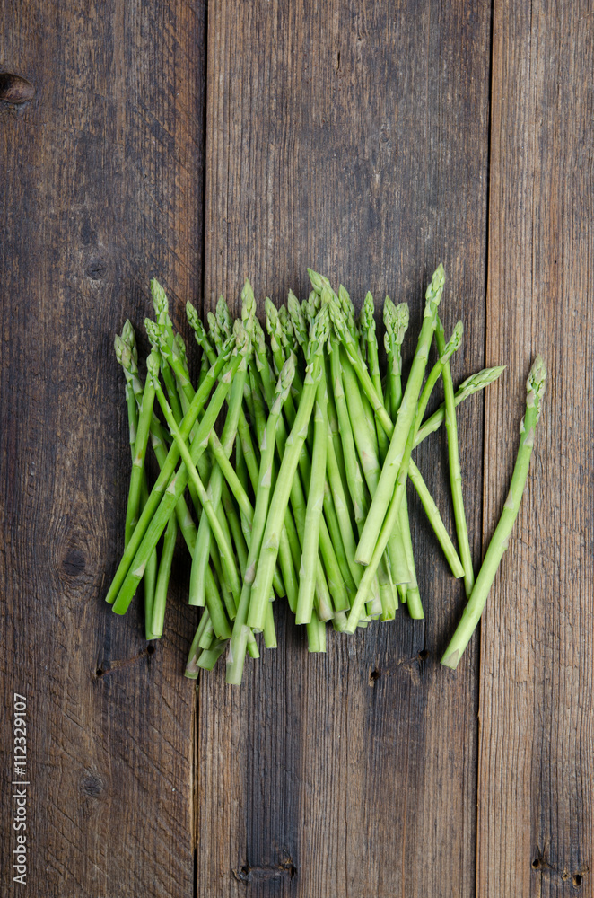 Fresh Green Asparagus on wooden table. Top view. Fresh Green Asparagus on wooden table. Top view.