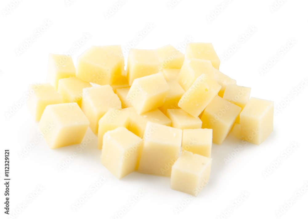 Cubes of cheese on white background. Top view. Cubes of cheese on white background. Top view.