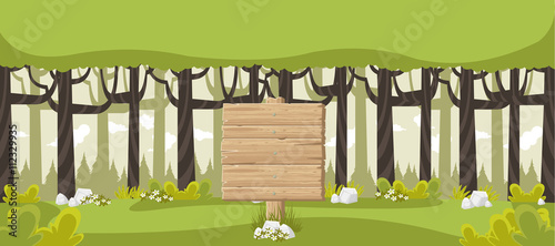 Wooden signs on green forest