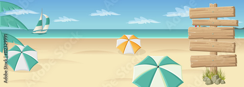 Wooden sign on beautiful tropical beach with blue ocean, umbrellas and palm / Coconut trees.
