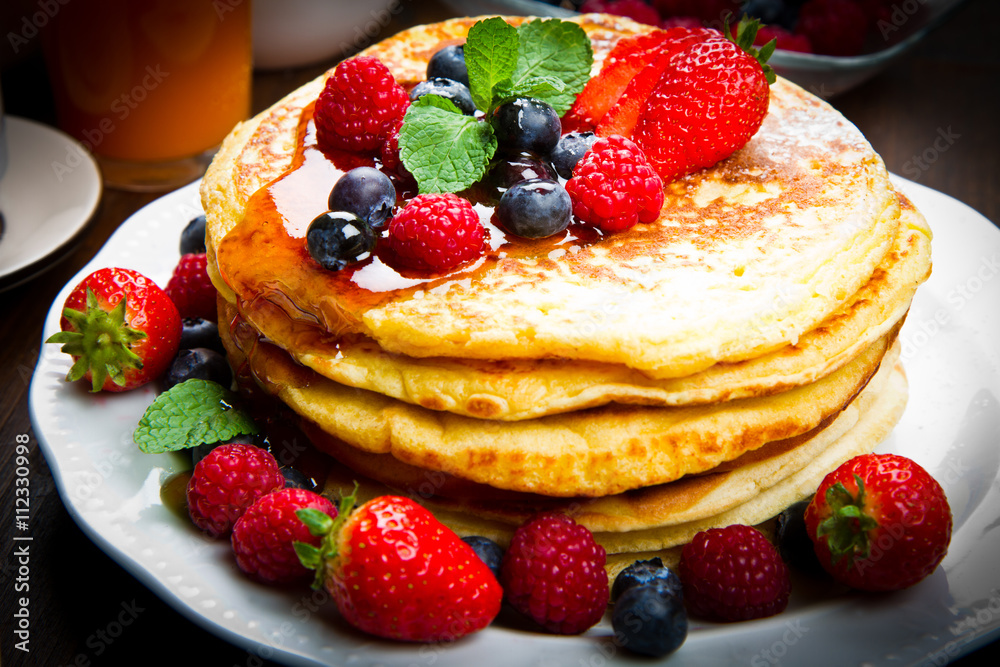 Pancakes with berries and maple syrup Pancakes with berries and maple syrup