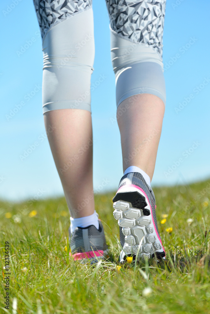 Young sports woman enjoys fitness and bright sunshine Young sports woman enjoys fitness and bright sunshine