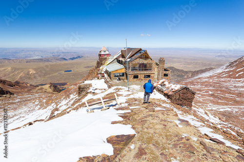 Mountain shelter hut building guesthouse, Chacaltaya ridge, Bolivia tourism traveling destination . photo