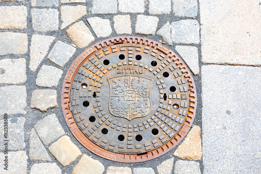 Zittau Coat, manhole covers, Saxony, Germany